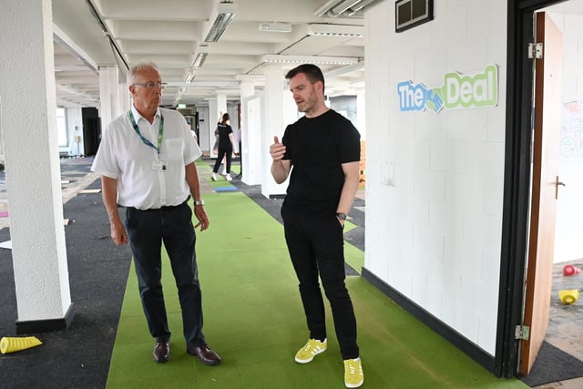 From left, Coun David Molyneux leader of Wigan Council chats with Tim Heatley founder of Capital&Centric, about ideas for the building transformation.
