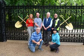 At the new Mowpin Lodge gates are, back row from left, construction project manager Ellie Colling, Dan Lea from Lost Art, Wigan Council leader Coun David Molyneux, Ian Kelly, site manager from HH Smith, front row, Coun Chris Ready and architect Sonoe Shimizu from Purcell Architects