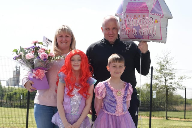 Holly Prince's parents Mark and Jenny, sister Evie, 10, and brother Jack, eight, visited the school