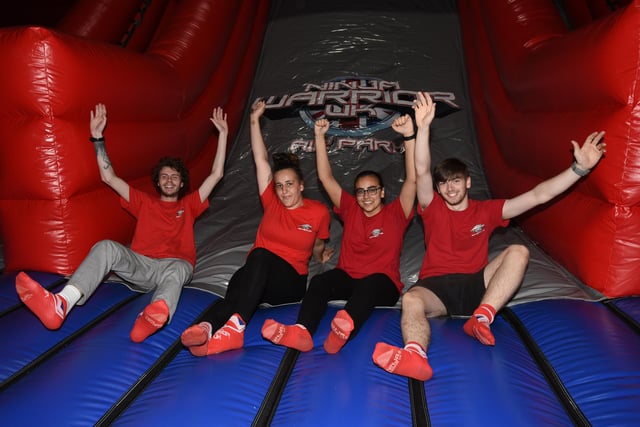 Staff members, from left, Lewis Kenyon, Tyler Picton, Haya Aref and Matthew Fisher at Ninja Warrior Wigan relaunch with a new Air Park.