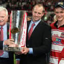 Wigan celebrate the 2010 Super Leauge title Ian Lenagan, Michael Maguire and Sean O'Loughlin.