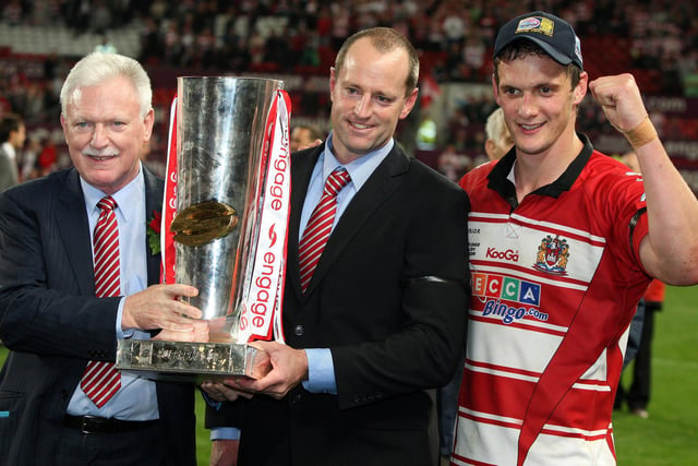 Wigan celebrate the 2010 Super Leauge title Ian Lenagan, Michael Maguire and Sean O'Loughlin.