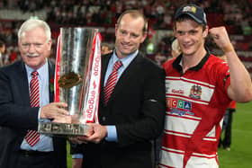 Wigan celebrate the 2010 Super Leauge title Ian Lenagan, Michael Maguire and Sean O'Loughlin.
