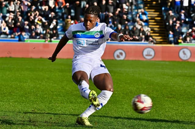 Joseph Hungbo in action at Wycombe before being forced off at half-time
