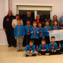 16th Wigan receive their Brighter Borough grant from local counsellors.
