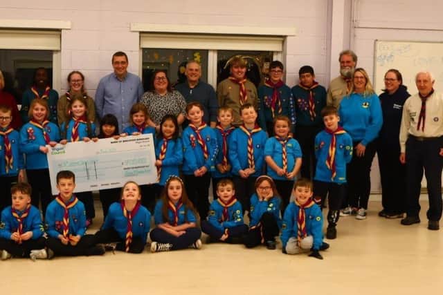 16th Wigan receive their Brighter Borough grant from local counsellors.