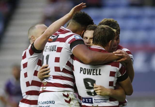 Wigan Warriors produced a 40-6 victory against Toulouse