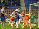 James McClean's corner somehow evades everyone to level the scores