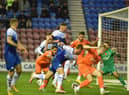 James McClean's corner somehow evades everyone to level the scores