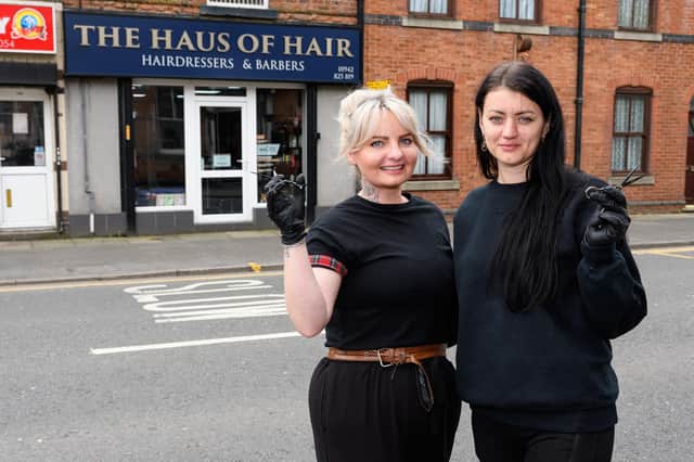 Owner Joanna Cottam has taken in Ukranian refugee Inna Hashynska to work at her salon The Haus of Hair in Wigan. Photo: Kelvin Stuttard
