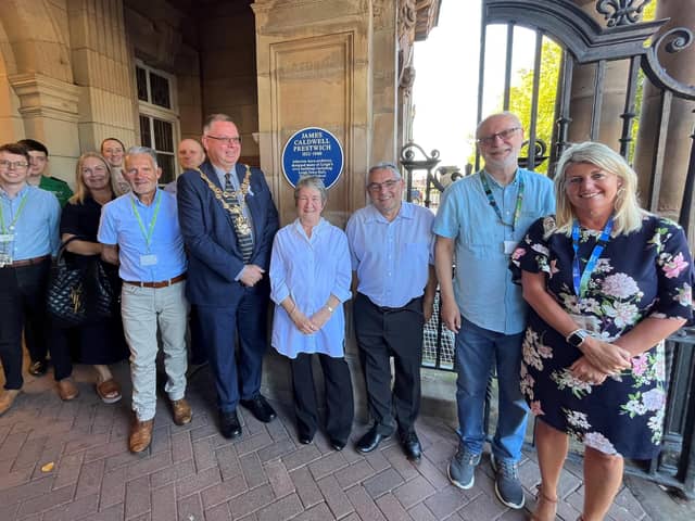Representatives gather to celebrate JC Prestwich's blue plaque