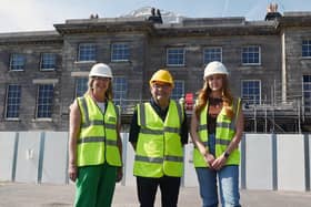 Transformation programme manager Clare Jones, Coun Chris Ready and construction project manager Ellie Colling outside Haigh Hall