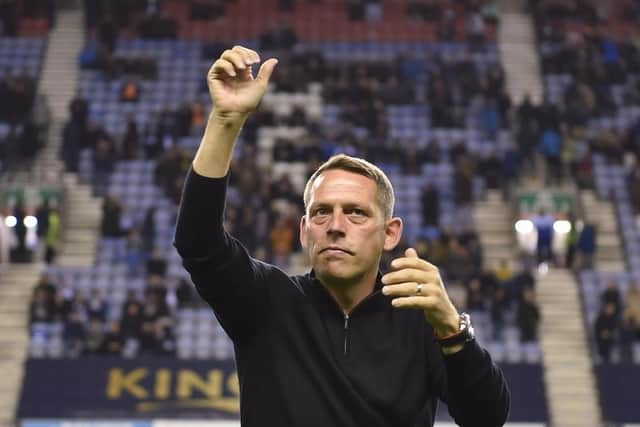 Leam Richardson rallies the fans before the victory over Blackburn