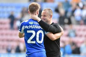 Shaun Maloney congratulates matchwinner Callum McManaman at the final whistle