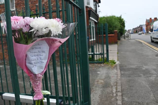 Flowers with moving messages have been left on Bolton Road, Ashton, for Kathleen Ann Kirby