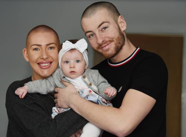 Estelle Wignall with husband Mike and their daughter Brooke last year