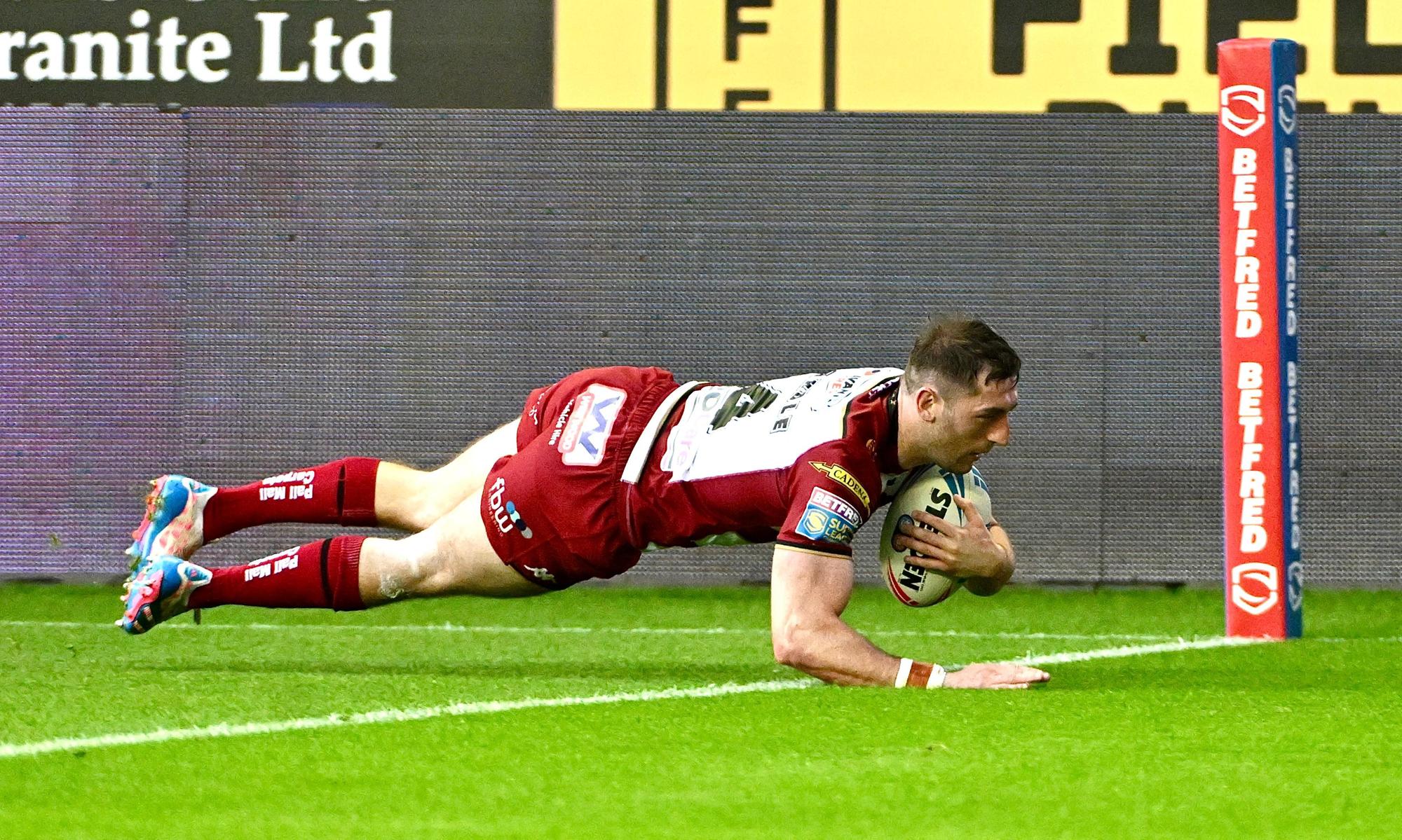Wigan Warriors produce stunning comeback against Huddersfield Giants to ...