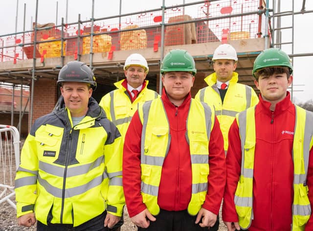 Redrow apprentices Liam Brown and Jospeh Potsid, in red, with Lee Serrio, Shaun Phoenix and Huw Williams
