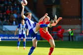 Jensen Weir competes for the ball in midfield