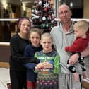Michael and Stacy Abram with their children Bethany, Jake and Jack at the sanctuary of the Greyhound Hotel in Leigh