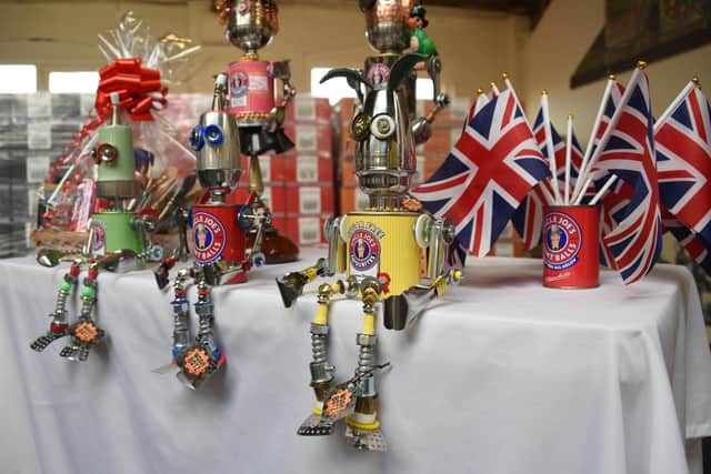 Uncle Joe's Mint Ball tins have been made into artwork, Woah Botz, multi-media robot sculptures created from recycled, reused and repurposed materials, created by an artist in America.