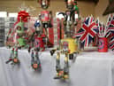 Uncle Joe's Mint Ball tins have been made into artwork, Woah Botz, multi-media robot sculptures created from recycled, reused and repurposed materials, created by an artist in America.