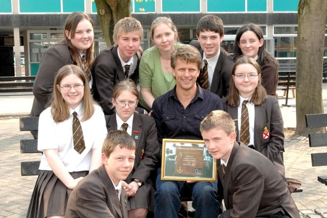 Byrchall high school pupils with TV presenter Andrew Castle celebrating the Fair Trade Tuck Shop swap at the school.