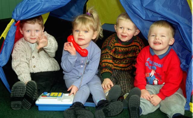 Here's a picture of the then newly launched Little Gems nursery in Springfield which was offering two new slots for children. Pictured, left to right: Declan Potter, Lucy Wilton, Mark Powerll and Daniel Gilmore in a play tent