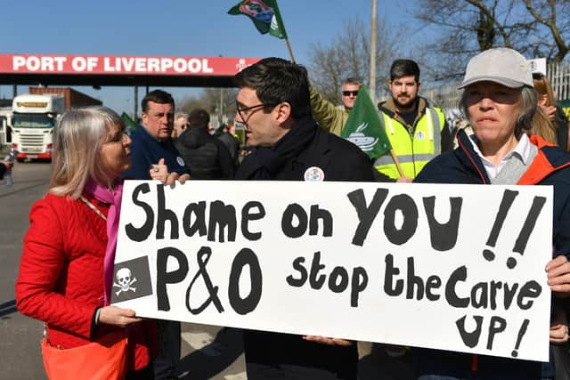 Mayor of Greater Manchester Andy Burnham outside the entrance to the Port of Liverpool