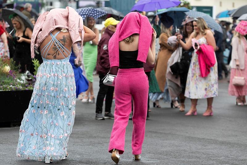 Aintree's best dressed ladies show off before the start of the Grand National tomorrow.