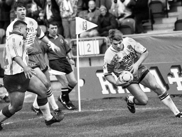 Wigan centre Gary Connolly scores one of his hat-trick of tries against Oldham in the Challenge Cup semi-final at Huddersfield on Saturday 25th of March 1995.
Wigan won the match 48-20.