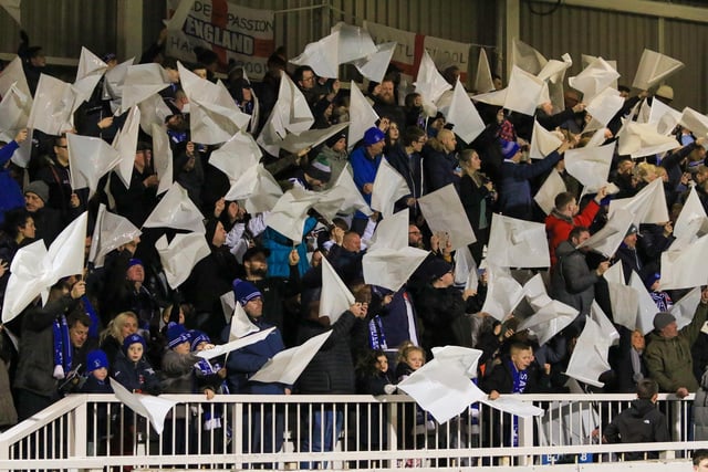 Hartlepool united supporters waving their flags ahead of kick-off in their semi-final with Rotherham United. Picture by Martin Swinney.