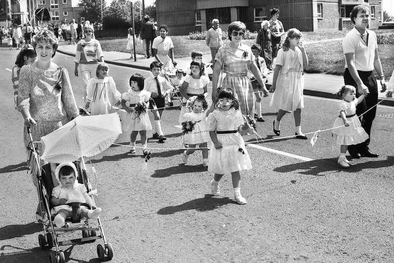 Strolling in the sunshine at St. George's, Wigan, walking day on Sunday 15th of June 1986.