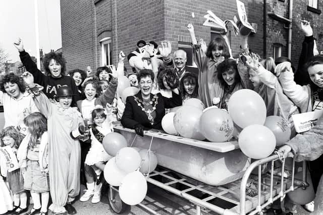 Coun Bennett proving she was a great sport when, during her mayoral year, she climbed into a tin bath on a bed to raise funds for charity