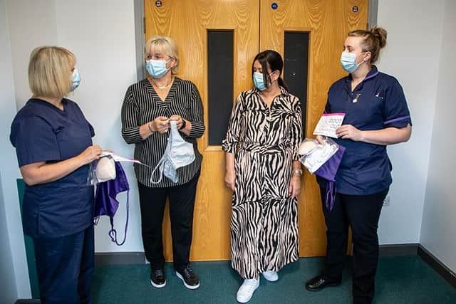 Marita Louis and Alison Roberts, centre, with Catherine Jackson, lead specialist breast care nurse, and Rosie Yates, specialist breast care nurse