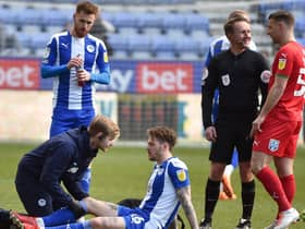 Glen Rea suffers his knee injury against Wimbledon