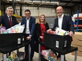 The launch of the Brick-by-Brick project, a new charity project based in Wigan. From left, Former Prime Minister Gordon Brown, Mayor of Greater Manchester Andy Burnham, CEO of The Brick Keely Dalfen and Amazon UK country manager John Boumphrey.