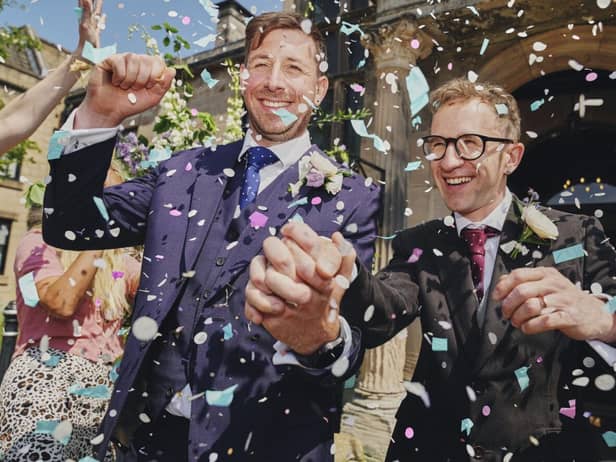 Daniel Anders-Holmes, right, and husband Adam in the new advert for Cancer Research UK