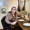 Pub manager Rachael Evans in the ladies toilets in The Thomas Burke, Leigh