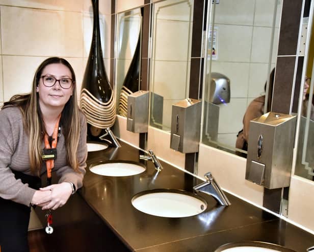 Pub manager Rachael Evans in the ladies toilets in The Thomas Burke, Leigh