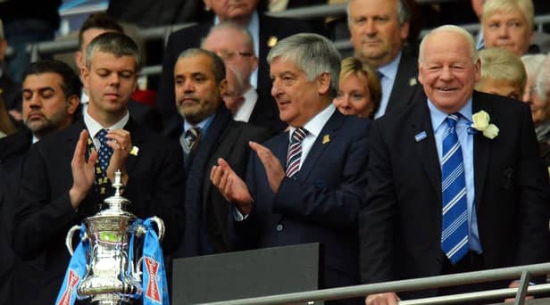 Wigan's David Clarke (far left), who was guest of honour at the 2013 FA Cup final, has been awarded an OBE
