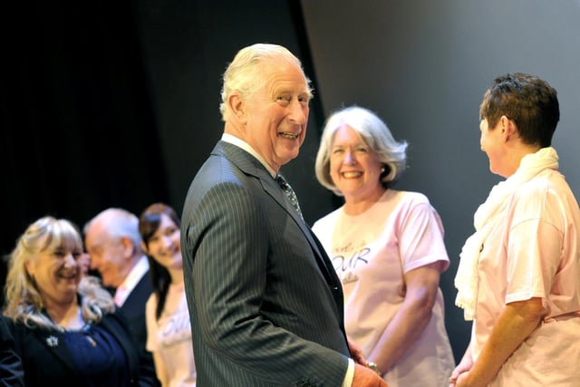 Prince Charles meets cast members at Wigan Little Theatre in April 2019.