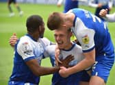 Max Power celebrates scoring his first goal in the Championship to put Latics ahead against QPR