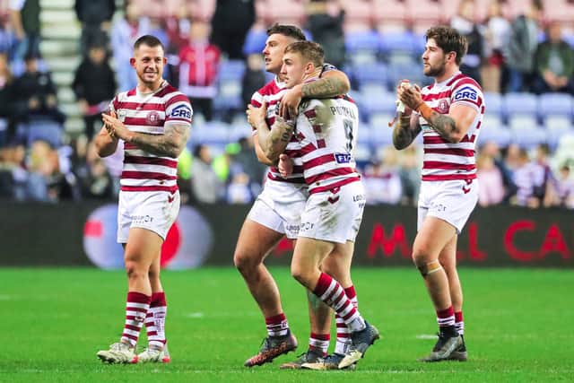 Wigan Warriors beat Salford Red Devils 20-0 to progress in the Challenge Cup