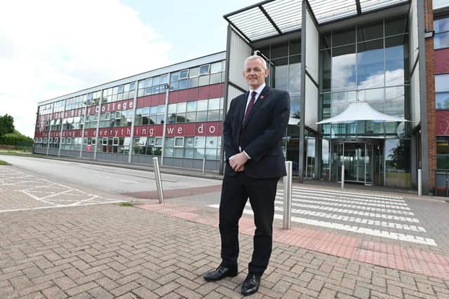 Peter McGhee outside his beloved St John Rigby College