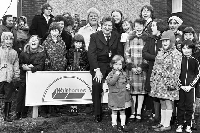 Actor Peter Adamson, who played Len Fairclough in Coronation Street, with fans at the new Wainhomes building site in Wigan Road, Westhoughton, which he officially opened on Sunday the 6th of March 1977. 