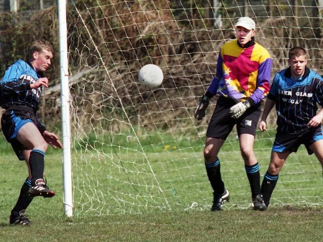 Action from Hawkley v Athletico Wigan in the South West Lancs Division 2 match on Sunday 16th of April 2000. Hawkley won 5-0.