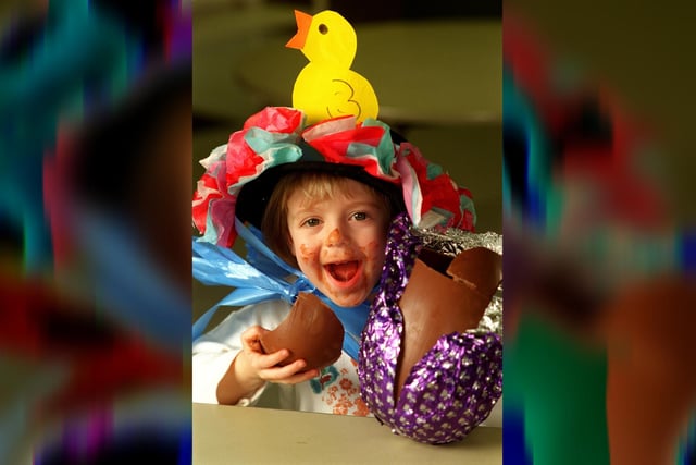 Holly Roden, 4, couldn't wait to tuck into her giant Easter Egg after donning her bonnet for some festive fun at Walkden Hall private Day Nursery in Wigan.