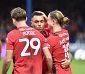 Thelo Aasgaard and Josh Magennis both claimed Latics' second goal at Peterborough