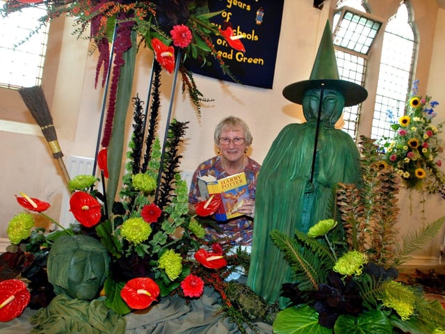 Eva Nickeas with her Harry Potter display at Trinity Methodist Church, Pemberton, where Wigan Flower Club were using flower arrangements to depict childrens literature.